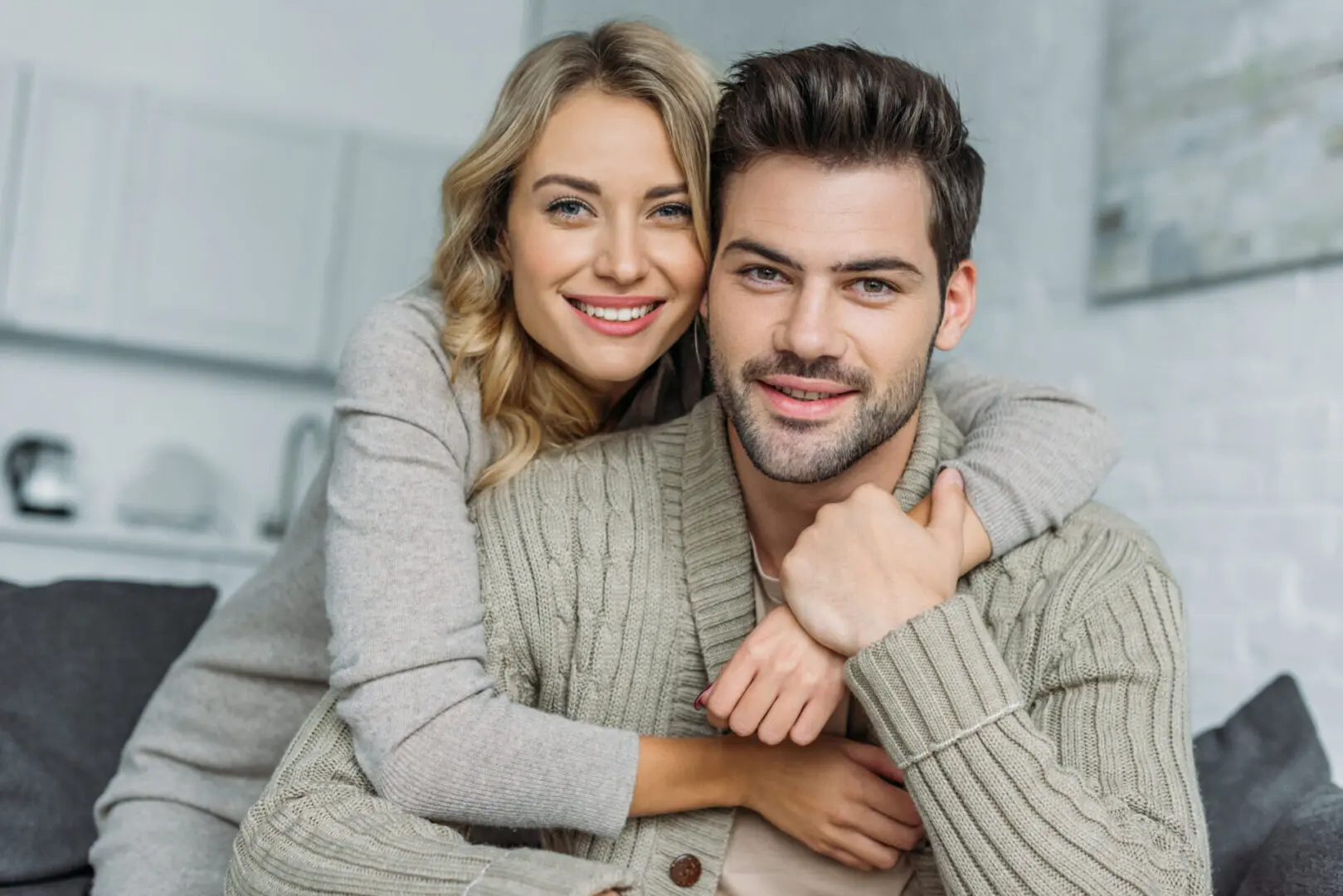 A man and woman posing for the camera.